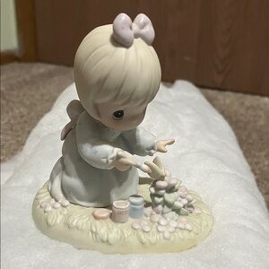 Charming Figurine with Bow and Flowers